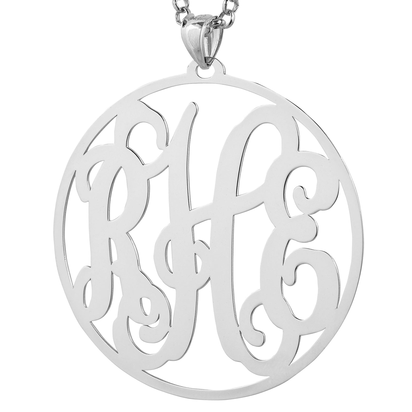 Front view closeup of a 2-inch laser-cut sterling silver circle monogram pendant detailing the personalized 3-letter initial design.