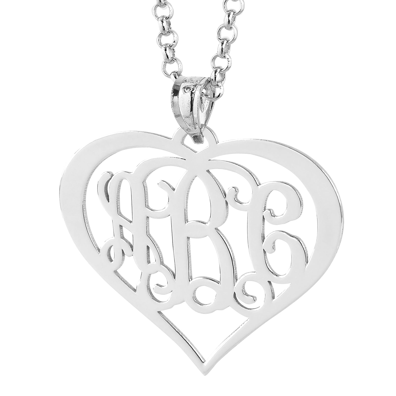 Close-up view of a custom laser-cut sterling silver heart monogram pendant featuring detailed script initials