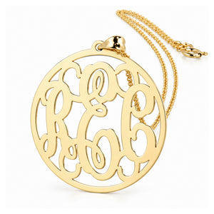 Custom 10K and 14K solid gold circle monogram pendant necklace with three initials and chain on a white background.
