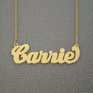 Close-up view of a handcrafted custom Carrie script name pendant.