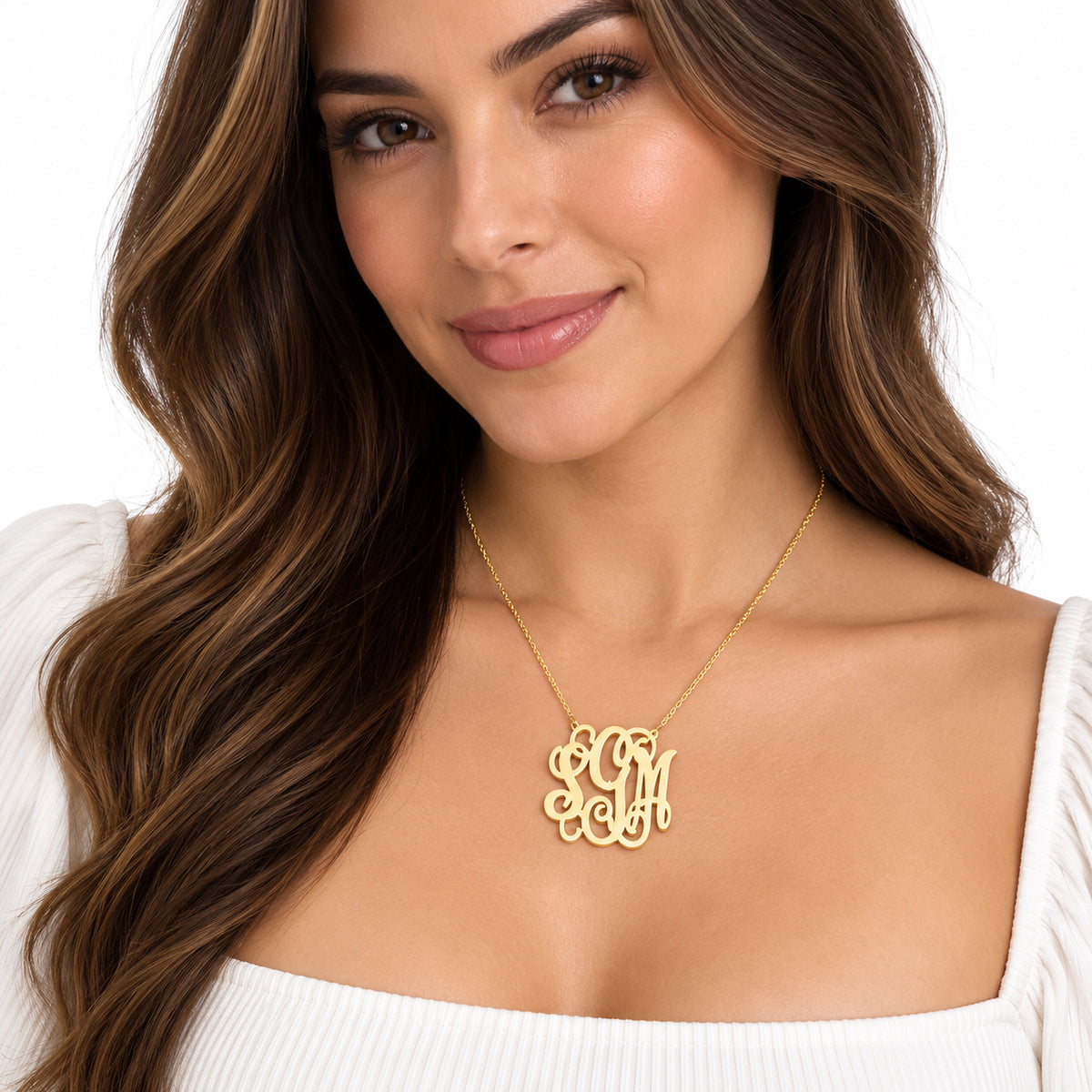 Woman wearing a custom 10k or 14k solid gold 3 initial monogram necklace