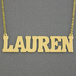 Customized 2-inch solid gold block letter name necklace featuring the name Lauren.