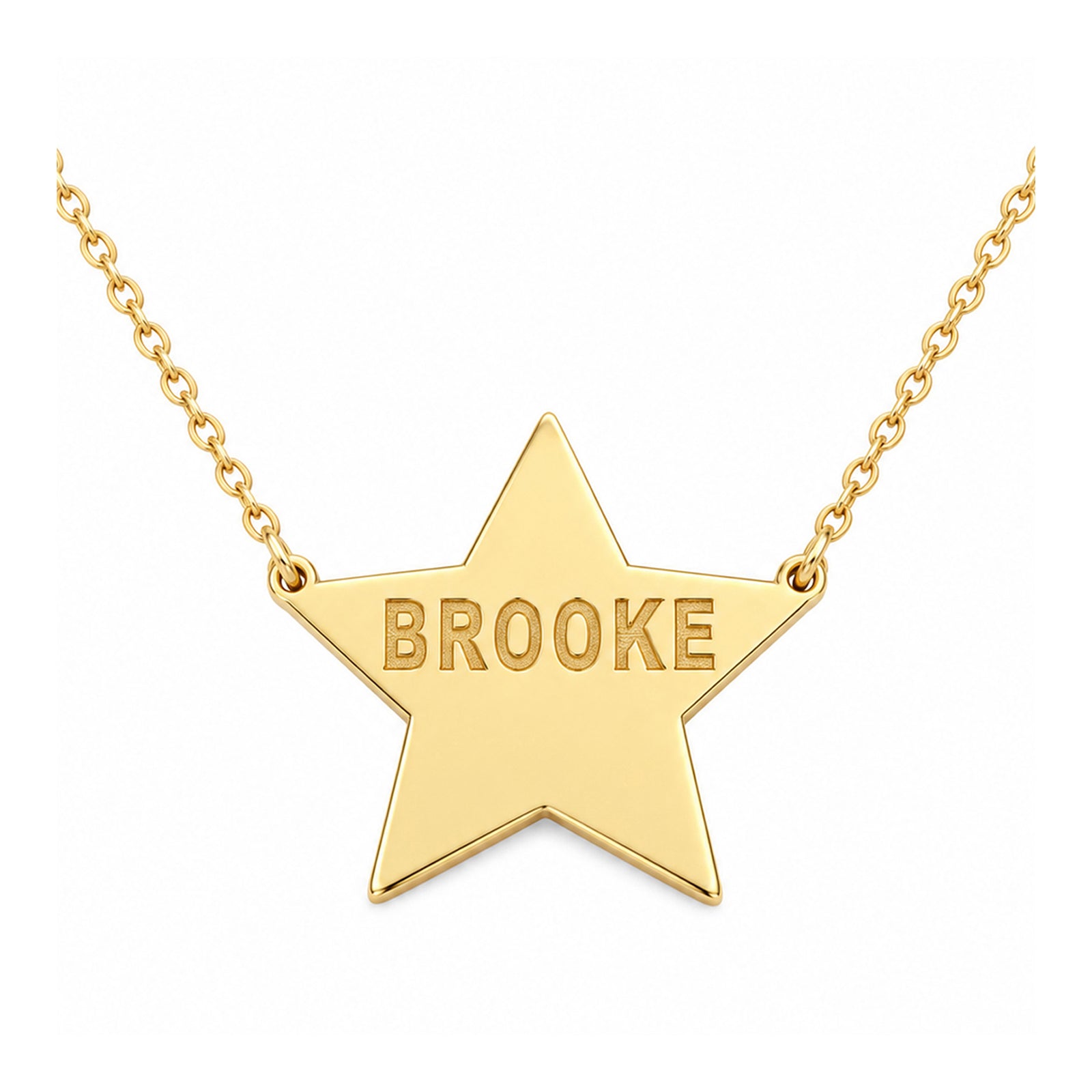 Yellow gold star necklace engraved with BROOKE, with the chain attached at both sides of the star, on a white background