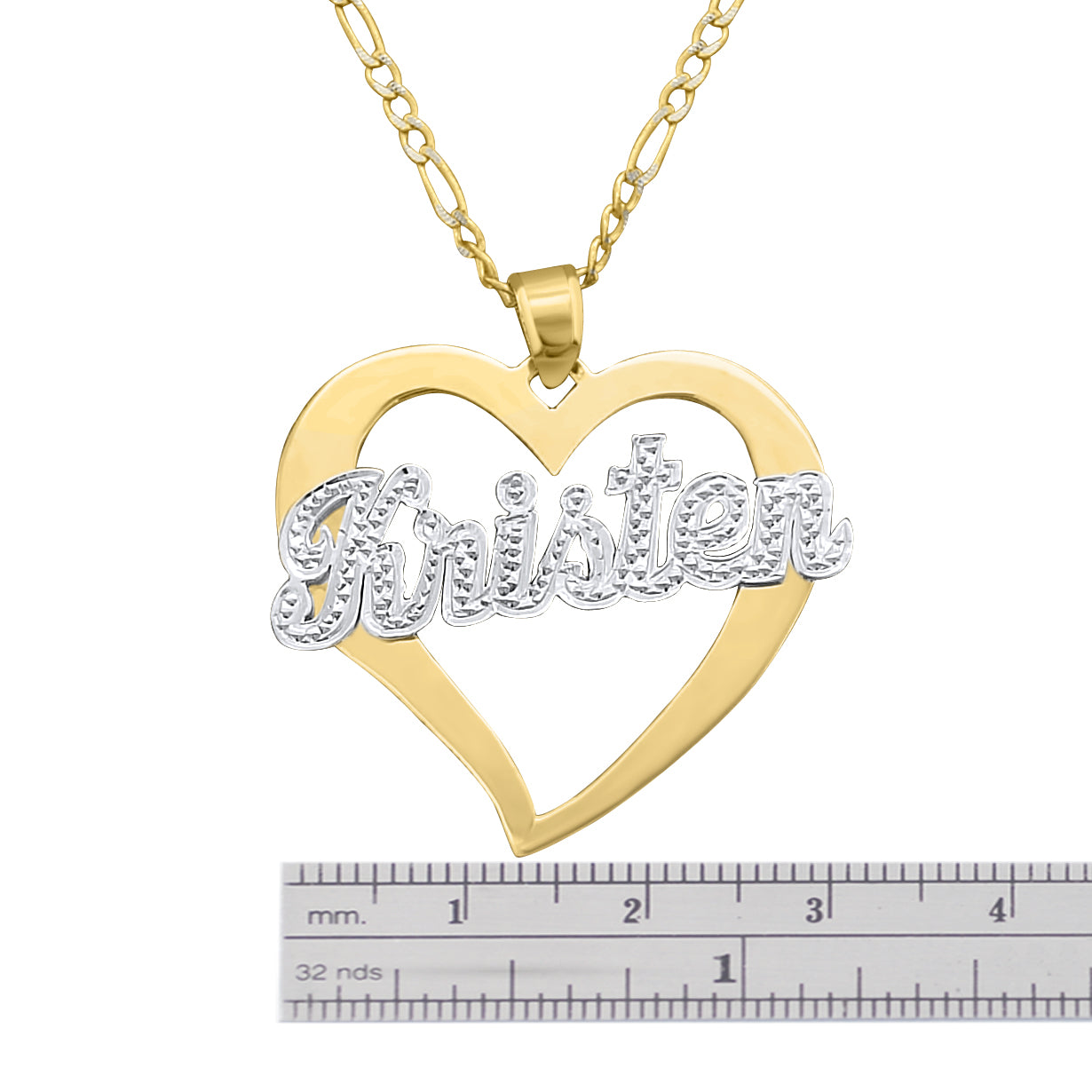 Close-up view of custom gold script name inside a yellow gold heart frame