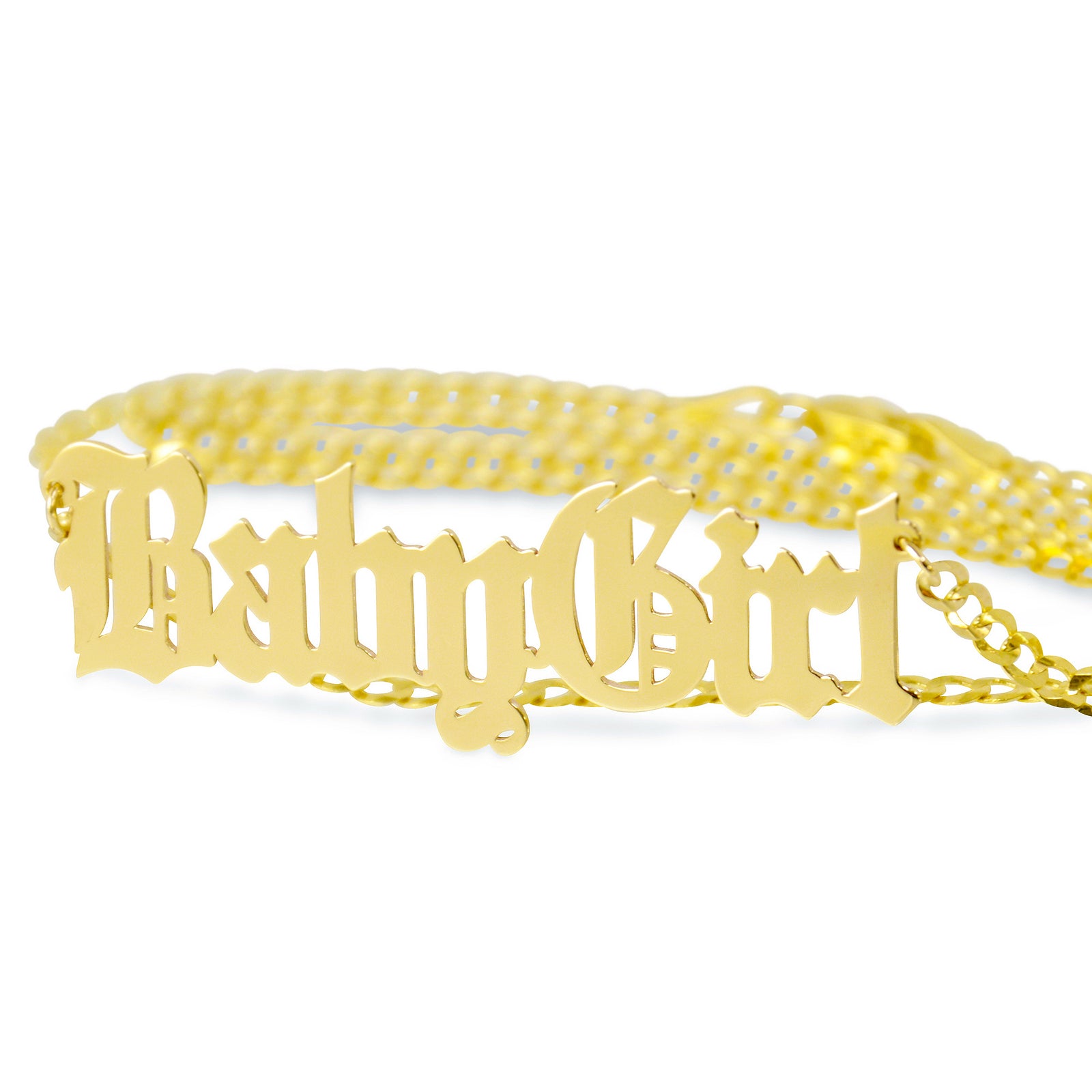 Woman wearing a custom 14k yellow gold gothic name necklace with a 3.0mm Cuban link chain.