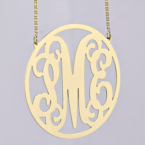 Handcrafted custom 10k or 14k solid gold circle monogram necklace made in Los Angeles.