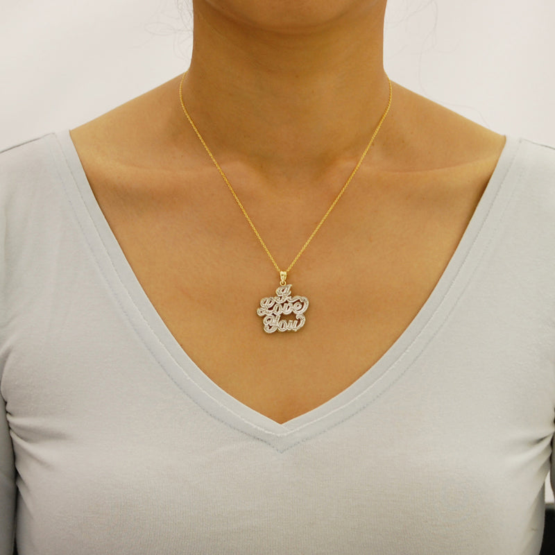 Model wearing the solid gold two-tone "I Love You" double plate pendant on a gold chain necklace.