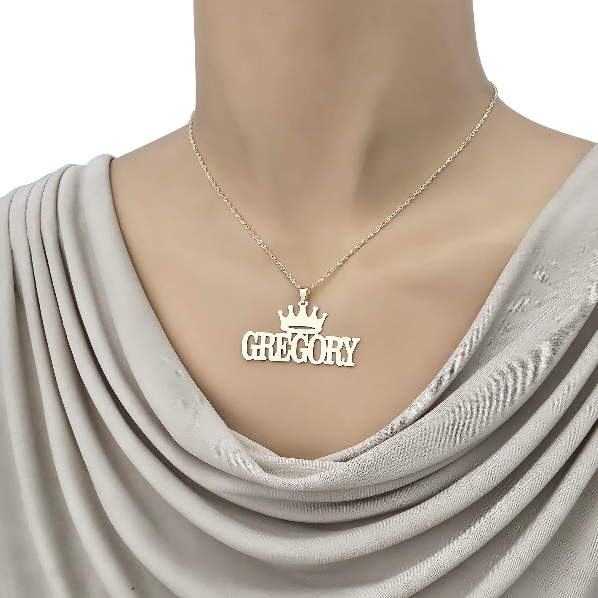 Model wearing a custom gold crown nameplate pendant spelling GREGORY on a 16-inch chain.