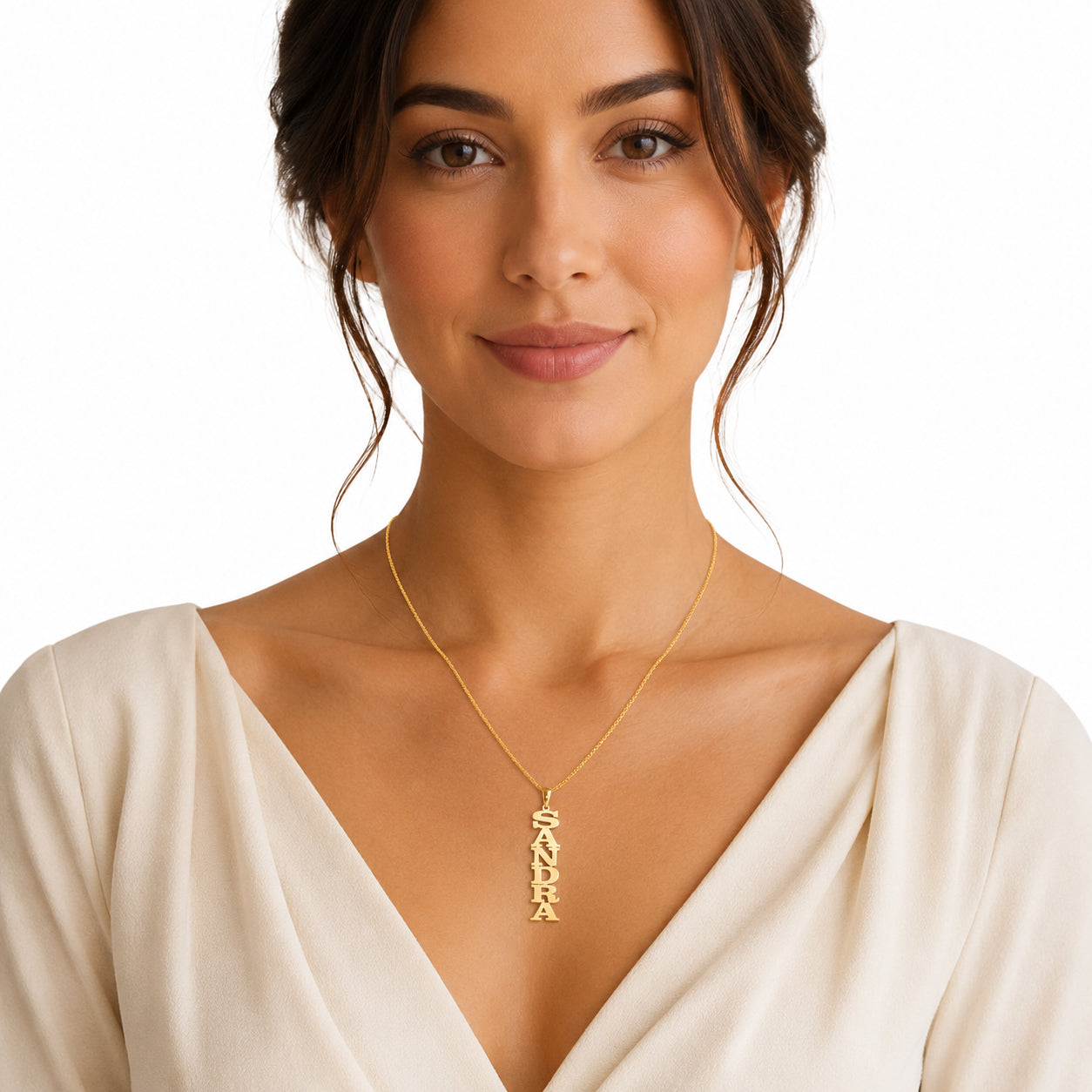 Model showcasing a custom gold vertical block nameplate necklace for an everyday fine jewelry look.