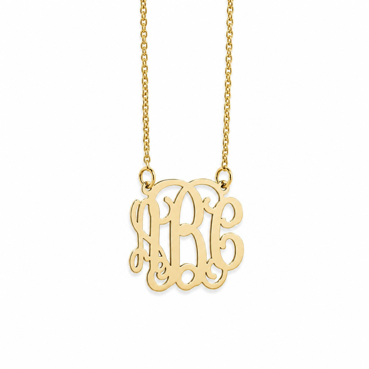 Close-up of a personalized mini 3-initial monogram pendant in 14k yellow gold