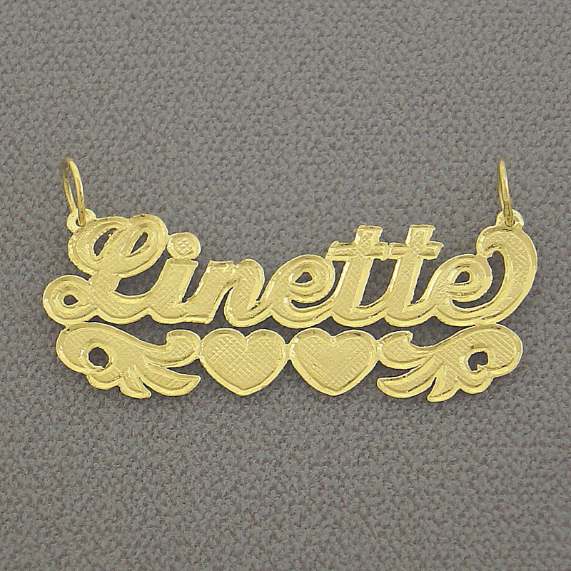 Custom solid gold check-pattern name pendant spelling Linette with double heart underline flourish.