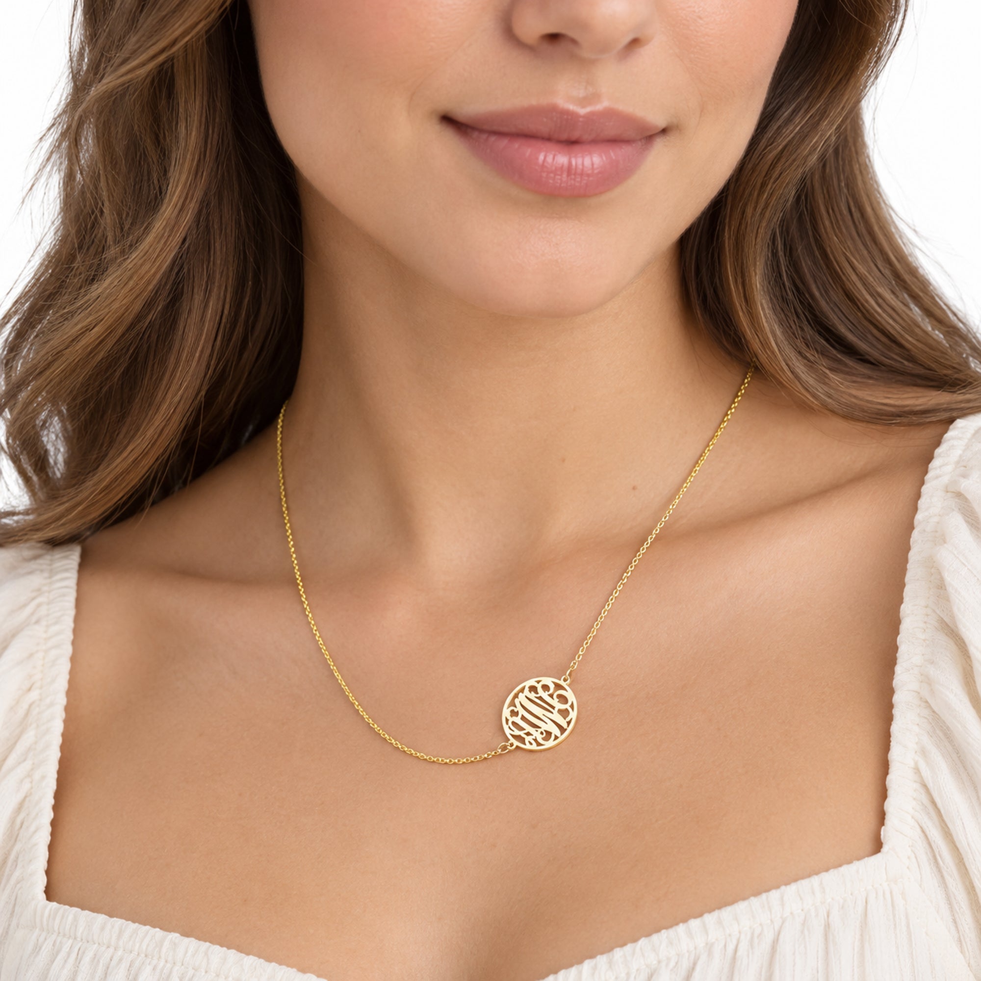 Personalized solid gold circle monogram necklace on a woman