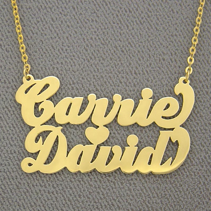 Personalized 10k or 14k solid gold two names heart necklace featuring the names Carrie and David in cursive font with a split chain.