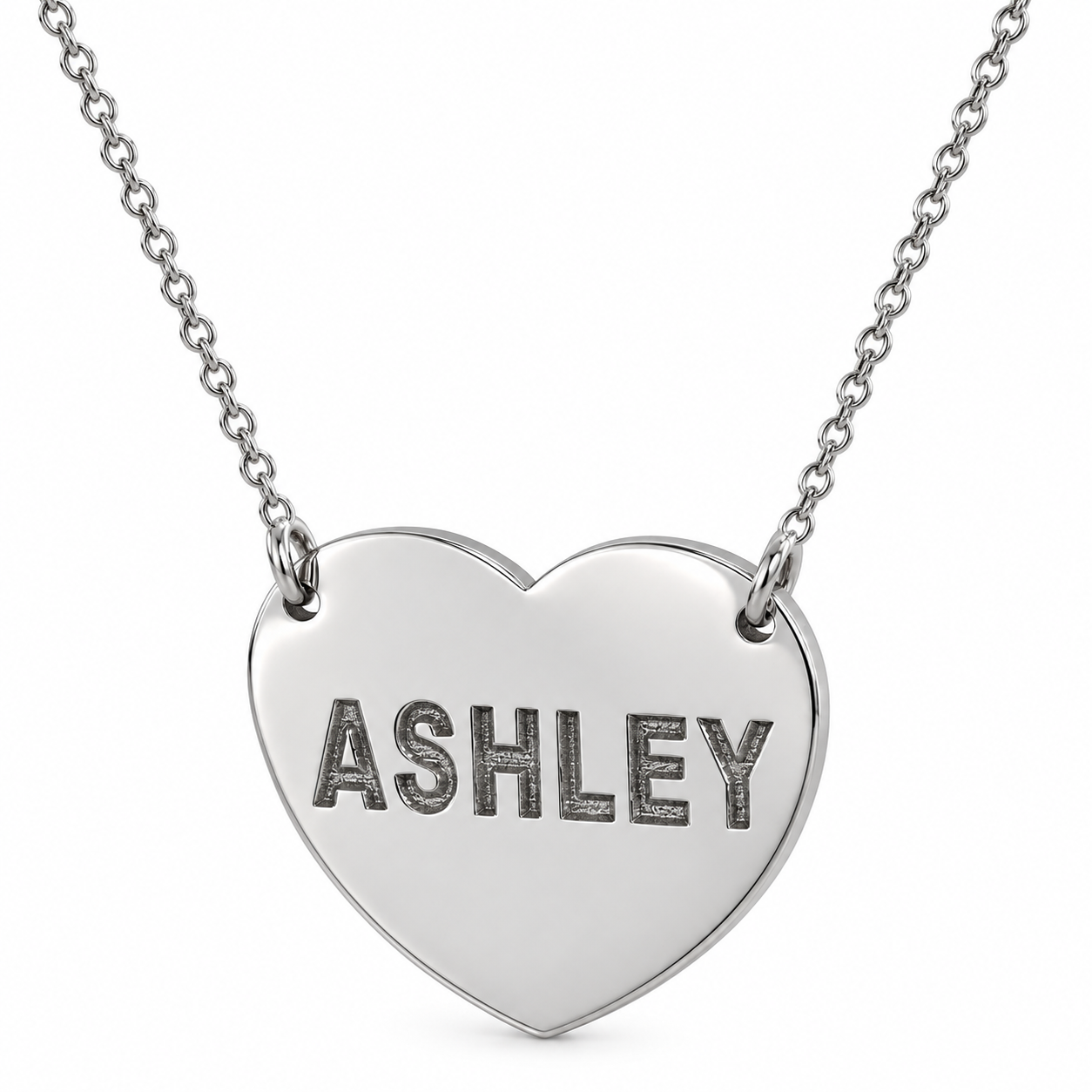 Personalized white gold heart necklace engraved with ASHLEY on a split Rollo chain