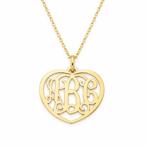 Small 10k or 14k solid gold heart monogram pendant with three custom initials on a gold chain.