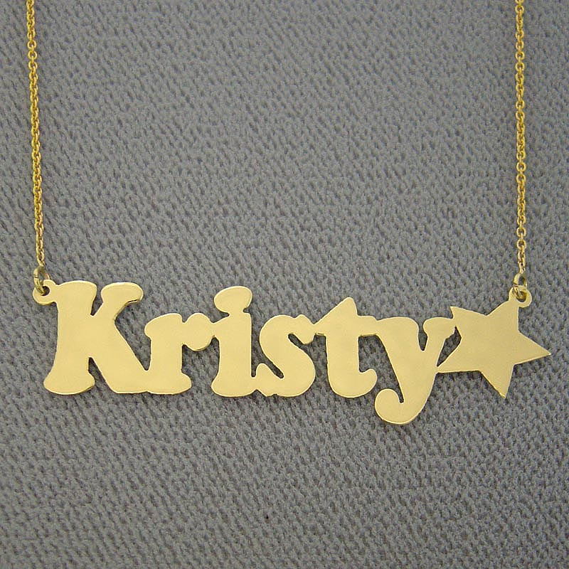 Solid 10k or 14k yellow gold personalized nameplate necklace spelling Kristy with block letters and a star end accent.