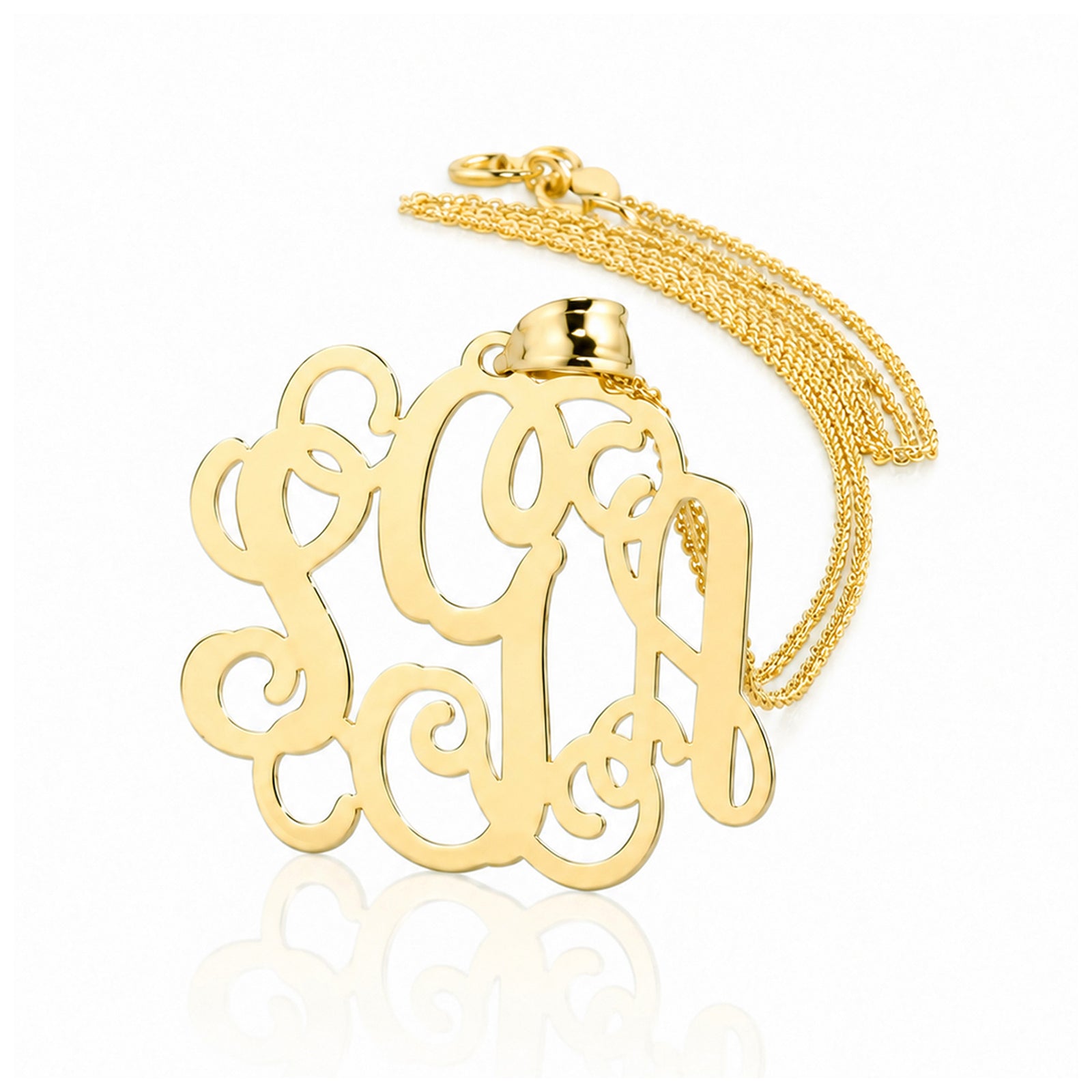 Solid yellow gold three-initial custom monogram pendant on a fine chain.