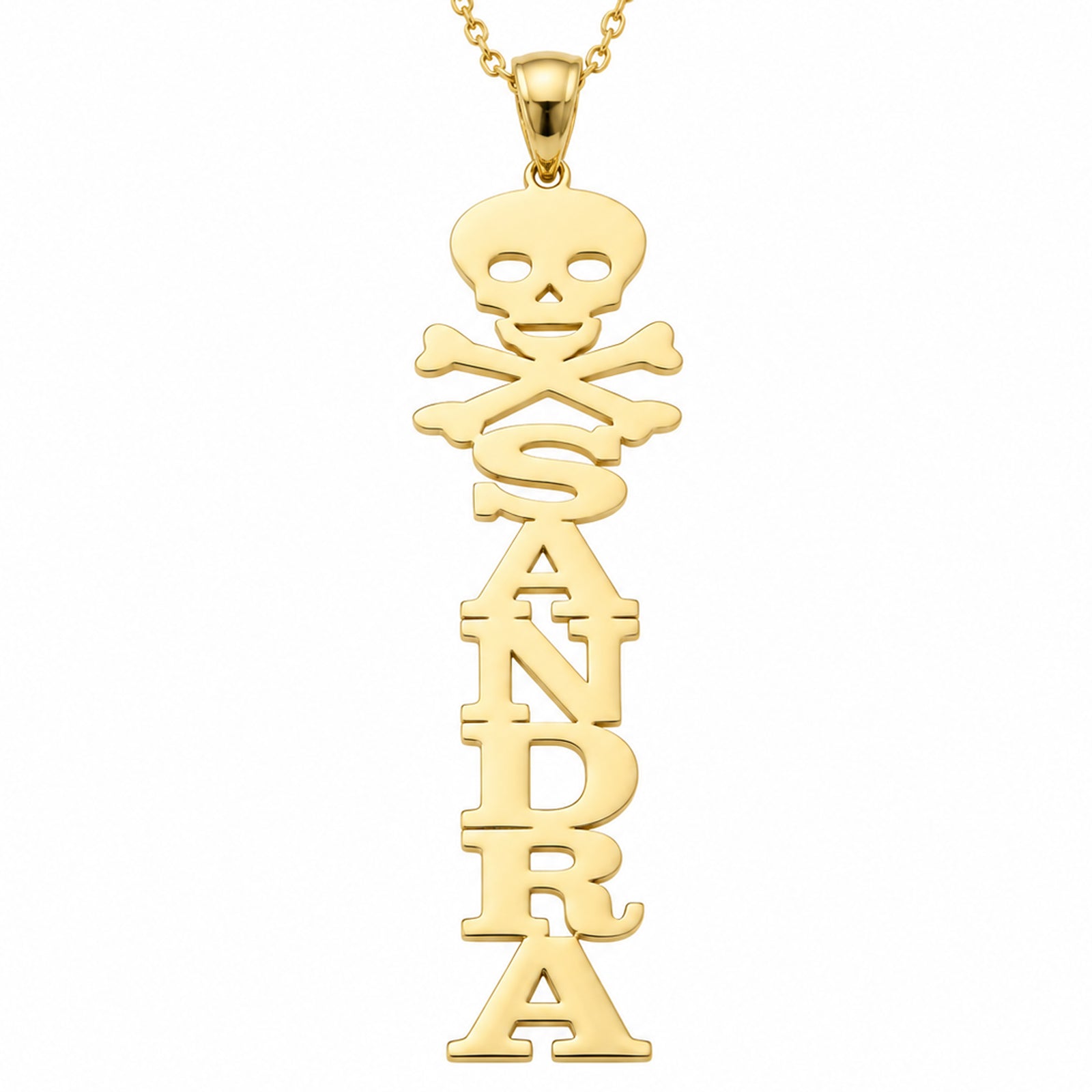 Close-up of a yellow gold vertical name pendant with custom block letters and a skull-and-crossbones design.