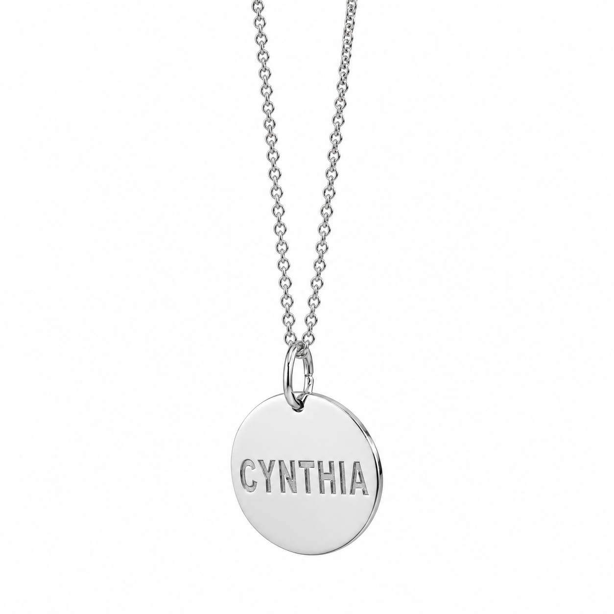 Solid white gold custom engraved round disc pendant attached to a matching delicate white gold chain.