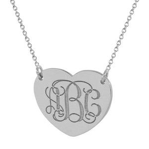 Custom laser-engraved 3-initial heart charm necklace in solid white gold.