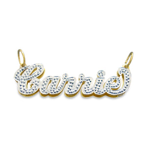 Custom 1.5-inch 3D double plate iced out gold name pendant featuring script lettering for the name Carrie.