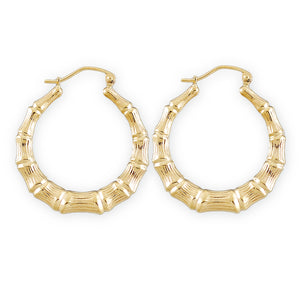 A pair of 1 inch 10kt gold hollow round bamboo earrings 