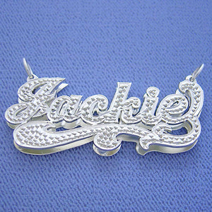 Personalized 3D double plate sterling silver name pendant spelling "Jackie" set with diamond accents.