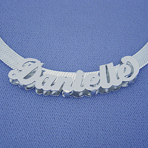 Close-up of 3D rhodium-plated sterling silver name slider pendant 'Danielle'