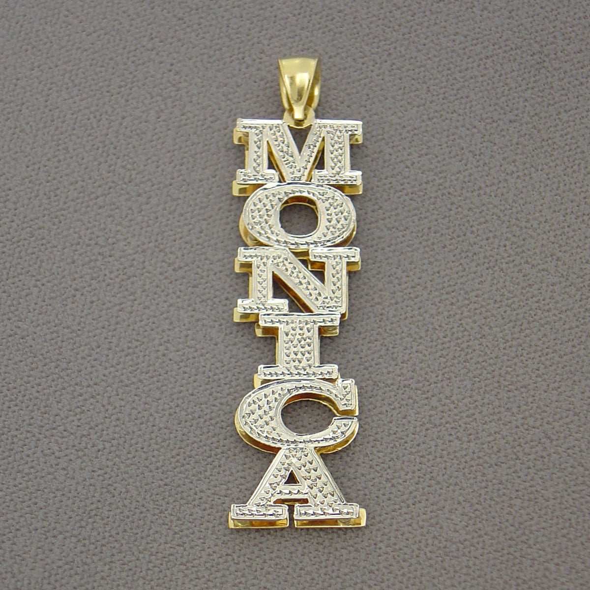 Back view of custom 3D double plate vertical gold name pendant showing official gold hallmarks