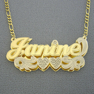 Front close-up view showing the double-plate design and laser-cut detail of the custom 3D gold nameplate.