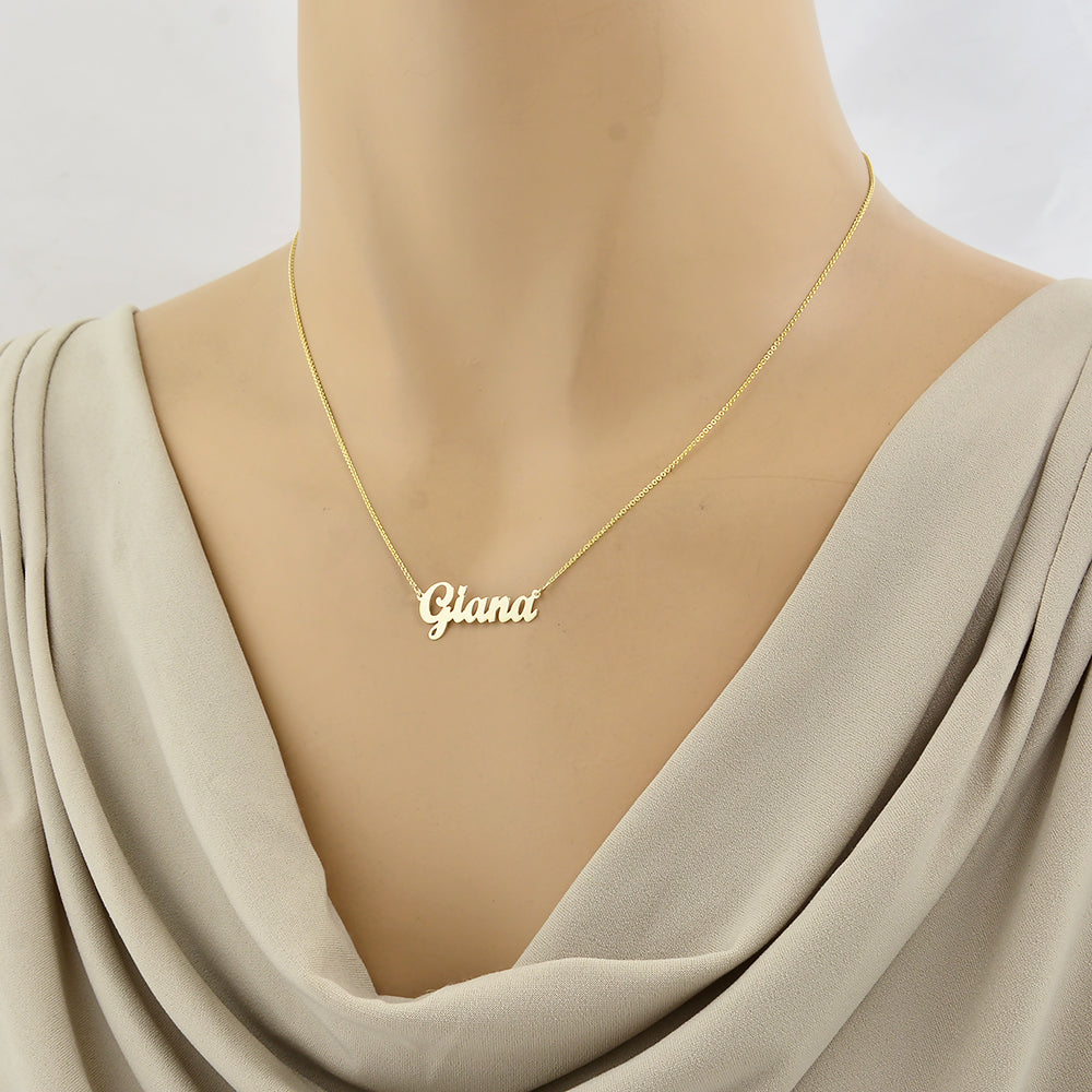 Custom Giana nameplate necklace in yellow gold on a 16-inch Rolo chain.