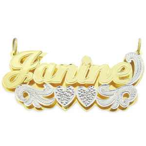 Large 3D custom gold name pendant featuring the name Janine with diamond-cut heart accents on a white background.