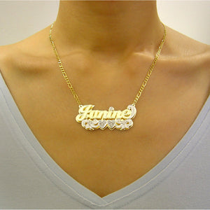 Model wearing the large personalized 3D gold name pendant paired with a gold chain.