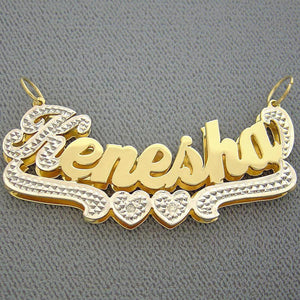Personalized 2-tone solid gold 3D name charm ND19 worn on a gold Cuban chain
