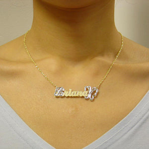 Model wearing the personalized 3D gold butterfly nameplate pendant on a solid gold chain.