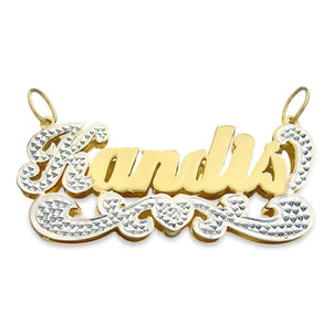 Custom 3D double plate gold name pendant spelling Kandis with two-tone white rhodium diamond accents and heart tail detail.