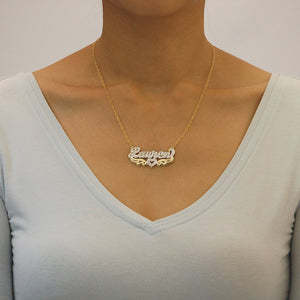 Model wearing personalized 3D double plate gold nameplate necklace with 10k 14k gold chain.
