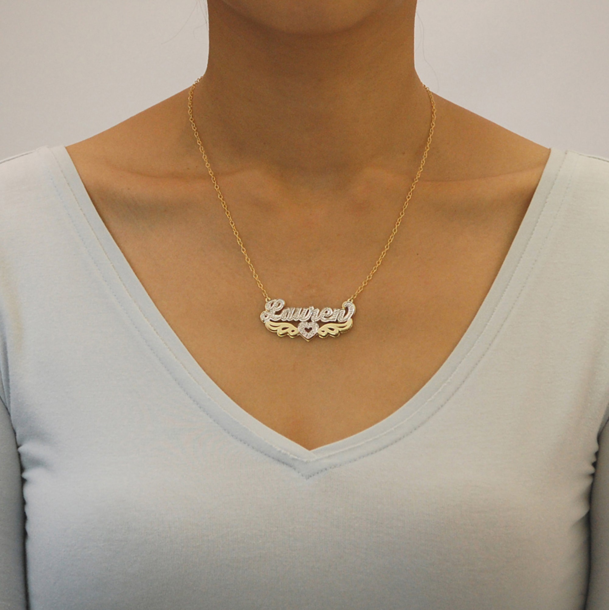 Model wearing personalized 3D double plate gold nameplate necklace with 10k 14k gold chain.