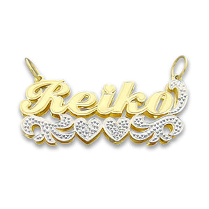 Small 10K gold 3D double plate name pendant spelling Reiko with diamond accents and two hearts underneath.